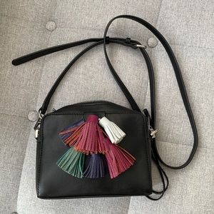 Black rebecca minkoff bag with tassels